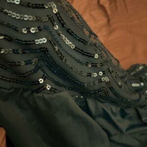 Sequin top  Sequin Embellished 
Turquoise hands well size large